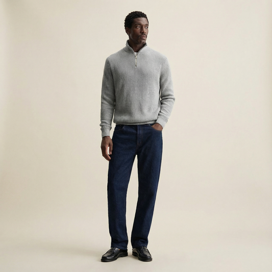 Light gray ribbed quarter-zip sweater styled with jeans and black leather shoes